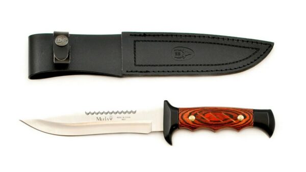 El 5161‑M, fabricado por Muela en España, es un cuchillo de hoja fija de tipo táctico/monte, diseñado para ofrecer fuerza, durabilidad y versatilidad