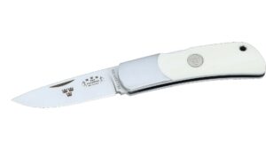 La Fallkniven Tre Kronor TK3eyc, Acero Elmax,  Elforyn Super Tusk blanco (imitación marfil) es una navaja premium